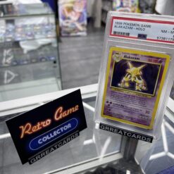 Pokemon TCG : Alakazam Holo 1/102 PSA 8
